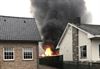 Beringen - Felle brand verwoest garage met oldtimers