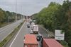 Beringen - Gat in wegdek, lange files
