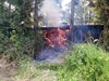 Neerpelt - Houtstapel uitgebrand