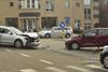 Beringen - Auto's botsen: bestuurster gekneld
