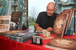 Boekenruilkast en live draw aan Kapittelhof