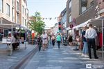 Stapelzot van overschot in de Kerkstraat